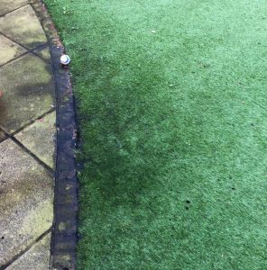 Black patches on artificial grass